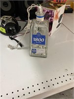 1800 silver tequila bottle light