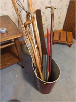 Collection of walking sticks and advertising