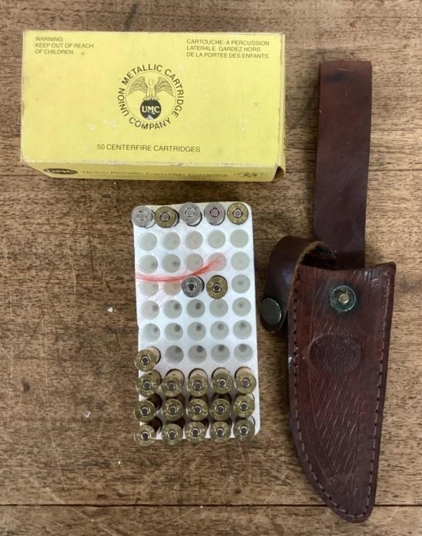 Partial box of ammo & knife sheath
