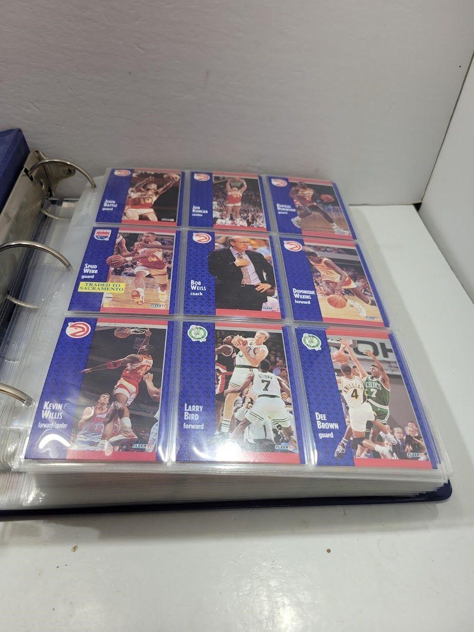 Binder of 1990s Basketball Cards