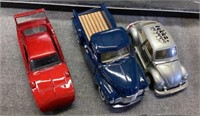 Three diecast collector cars