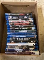 Box of Blu-ray discs features titles such as