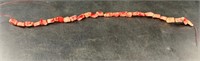16" Strand of red and white coral beads