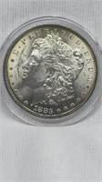 Of) 1883 Morgan Dollar condition MS
