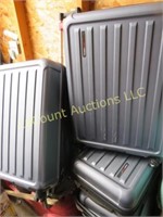 assorted suitcases by travelers choice