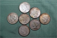 7 US Peace type silver dollars: 1922 D, (3) 1922 S
