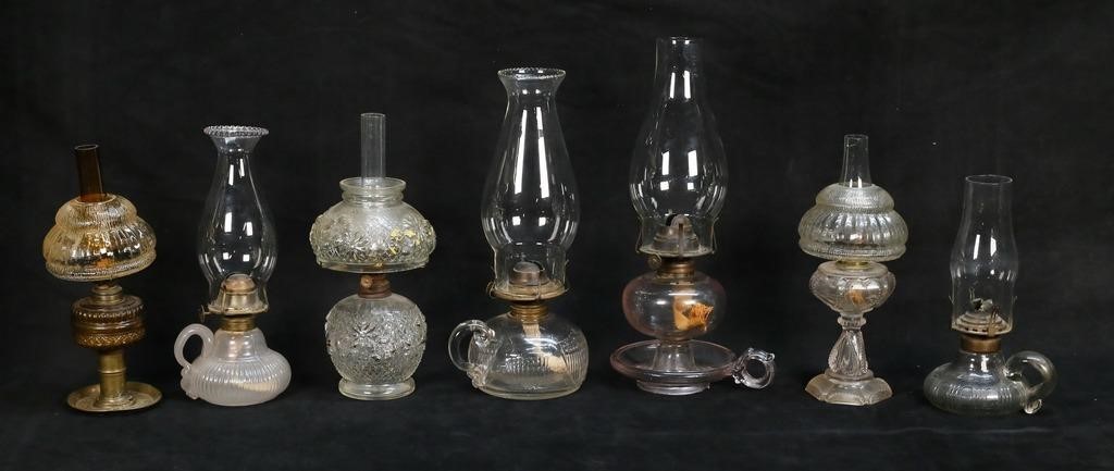 7 Glass Oil Lamps With Miniatures