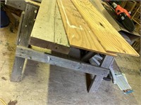 2 sawhorses with 3 boards