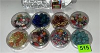 8 containers of beads