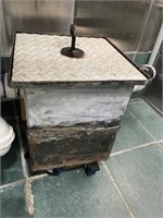 Grease Trap   On casters which makes overall