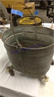 Galvinized mop bucket 
 Missing 1 wheel