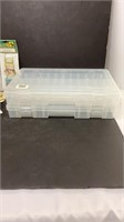 Two plastic organizers, stretch and stitch bars,