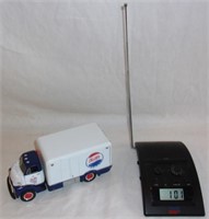 Pepsi w/ working clock radio.
