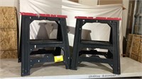 Pair of lighter weight red top plastic sawhorses,