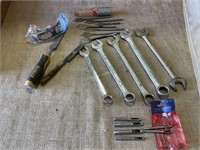 Wrenches, hollow punches, wood drill bits.