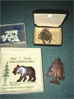 Hand carved redwood pins