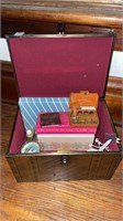 Chest with variety of vintage items