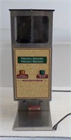 Curtis Commercial coffee grinder.