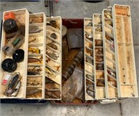 Tackle box full of lures some are wooden