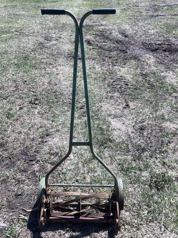 Vintage manual push reel mower. Needs sharpening.
