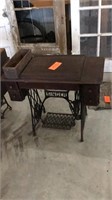 Singer treadle sewing machine/cabinet
