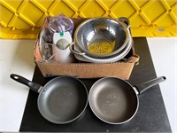 Box with pans, colanders, and dicer