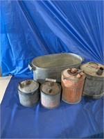 Galvanized tub, kerosene cans, and a gas can