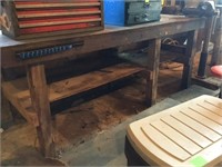 7' Wooden shop bench, 4"x4"s, planks, with a vise