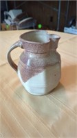 PITCHER MADE OF POTTERY