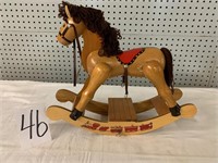 Wooden musical rocking horse