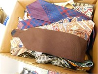 Box of assorted ties in various colors and