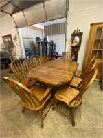 solid oak dual pedestal table w/8 chairs & 2-18" b