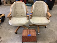 Rolling captain chairs and wicker ottoman