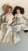 (2) Antique blue eyed dolls