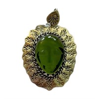 Face Carved Green Glass Pendant
