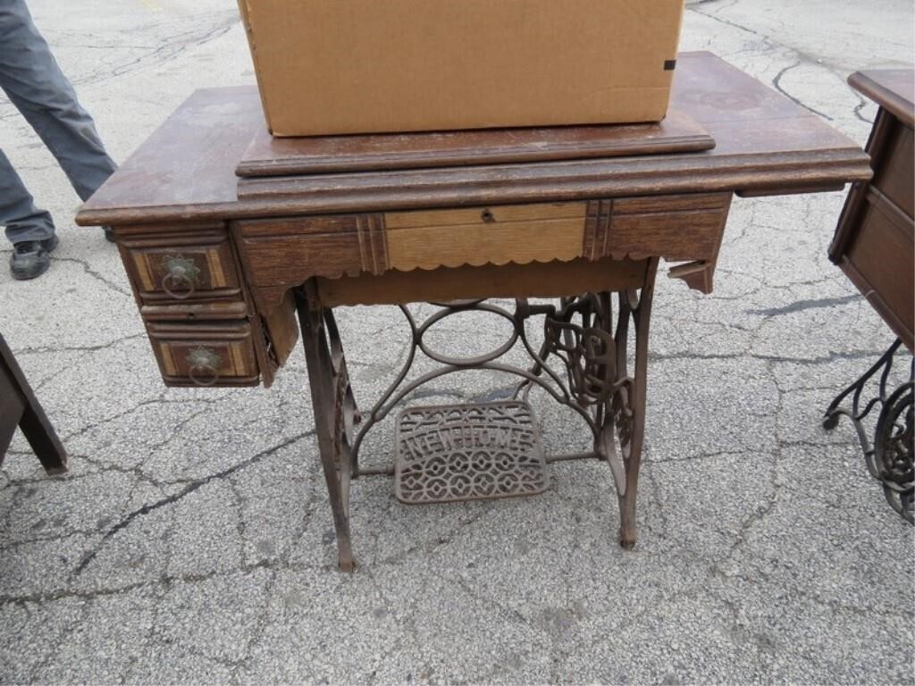 Antique New Home sewing machine w/base.