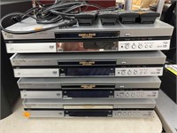 4 cnt DVD Video Recorders w/  4 remotes & 2 power