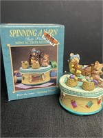 Enesco spinning a yarn music box