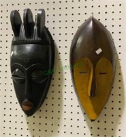 Lot of two carved wooden African mask wall
