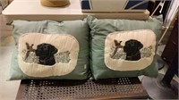 One matching pair of throw pillows with