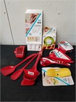 Assorted new kitchen utensils and funny