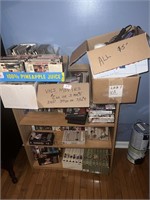 BOOKSHELF FULL OF VHS AND DVDS