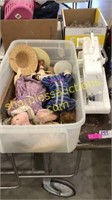 Singer sewing machine, box of dolls& accessories