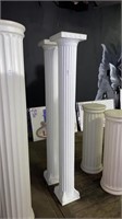 Two 6 ‘ tall, plastic decorative columns