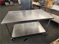 60" X 30" SS TABLE ON WHEELS - 35" TALL