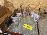 Budweiser beer, glass pitcher and pint glasses