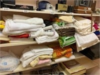 LARGE LOT OF TOWELS IN CLOSET