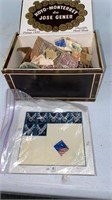 Stamps for collecting in Cigar box
