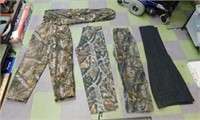 Grouping of hunting clothes that includes Pair of
