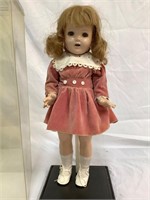 Antique doll on stand with cover 19” tall